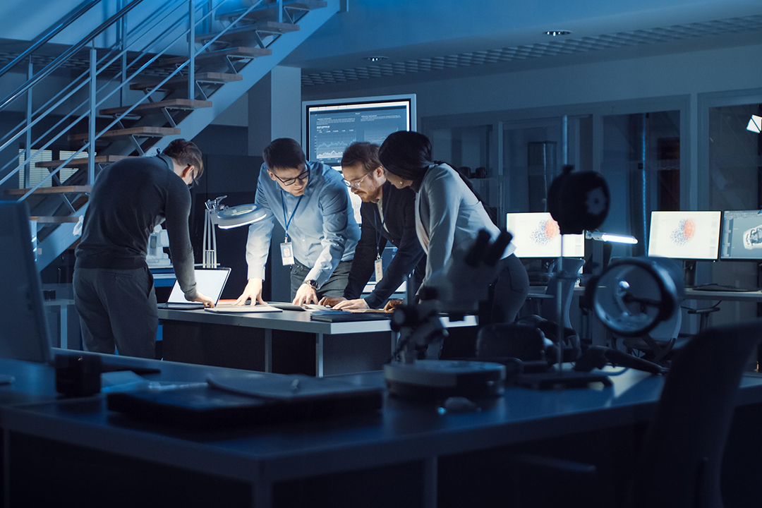 engineer or analyst monitoring digital data visualization
